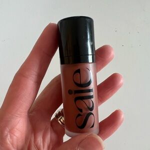Saie liquid blush in Spicy